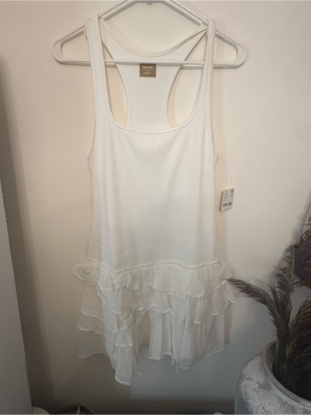 Free people White Ruffle Hem Tank Top romper size large NWT